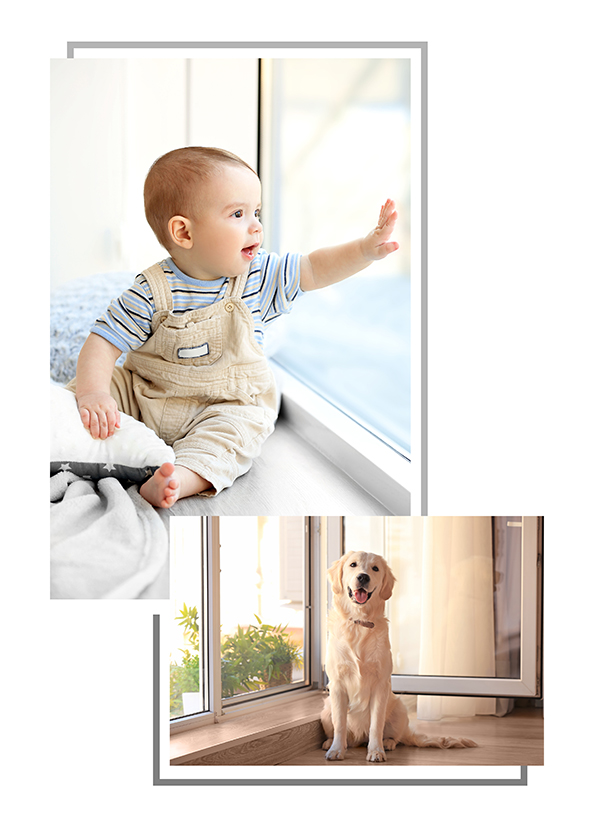 Little Baby Boy Looking Out The Window At Home